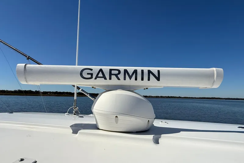  Yacht Photos Pics Garmin radar on 2022 Regulator 34 boat against clear blue sky.