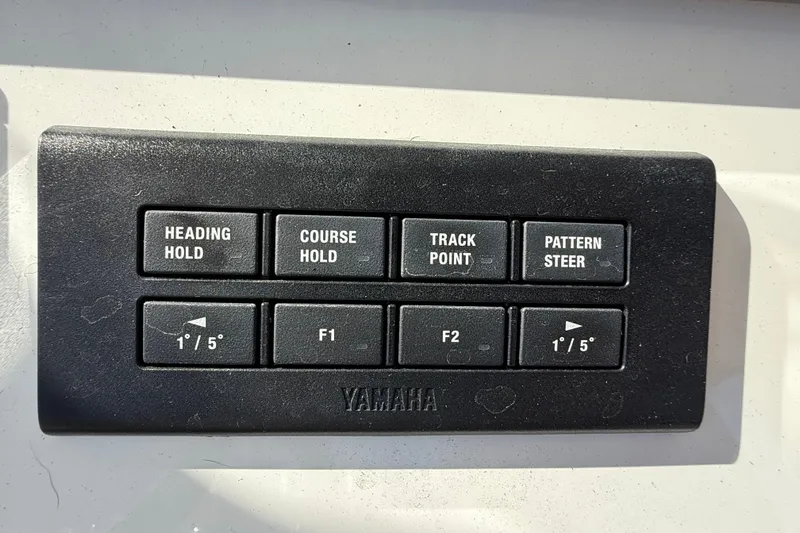  Yacht Photos Pics Control panel on a 2022 Regulator 34 boat with Yamaha navigation buttons.