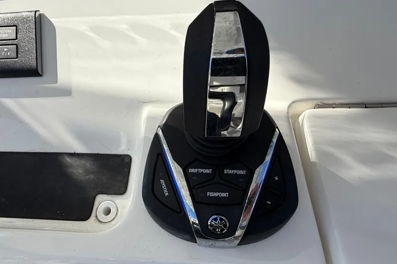  Yacht Photos Pics Joystick control panel on 2022 Regulator 34 boat, featuring drift and stay point functions.