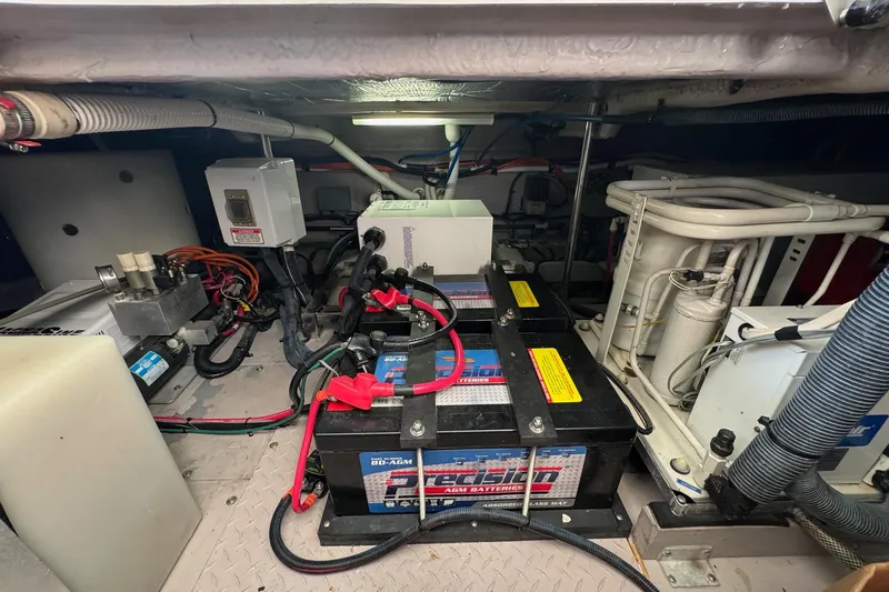  Yacht Photos Pics Engine room of 2003 Sea Ray 480 Sedan Bridge with batteries and wiring.