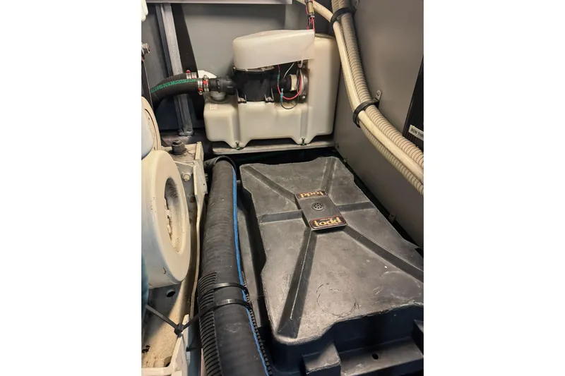  Yacht Photos Pics Engine compartment of 2003 Sea Ray 480 Sedan Bridge with visible components and wiring.