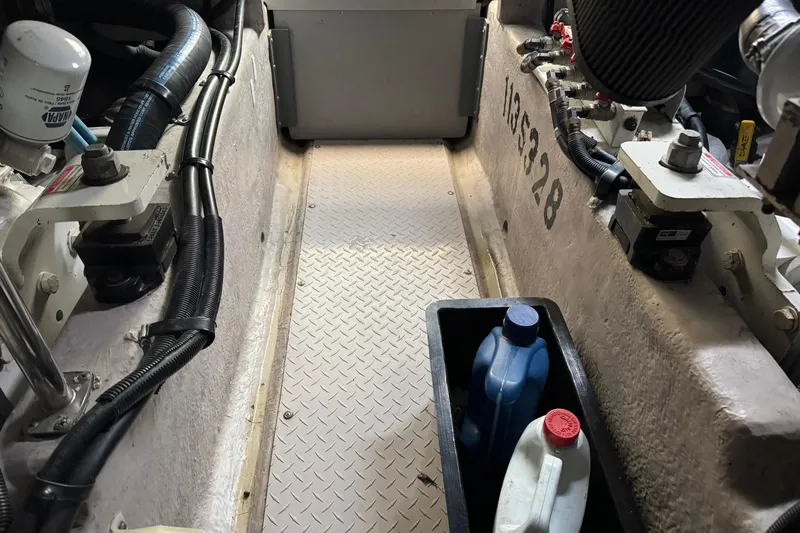  Yacht Photos Pics Engine room of a 2003 Sea Ray 480 Sedan Bridge with maintenance supplies.