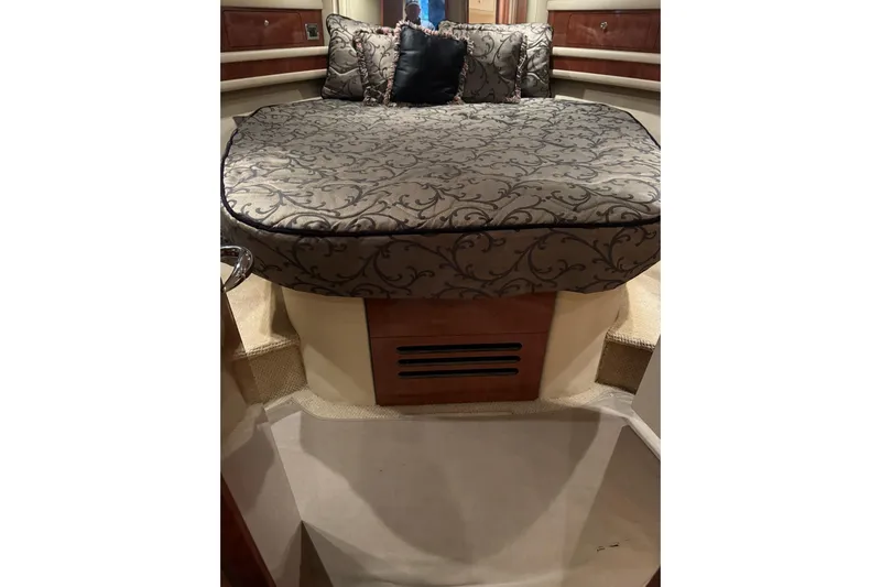  Yacht Photos Pics Luxurious 2003 Sea Ray 480 Sedan Bridge cabin with elegant bedding and cozy interior.