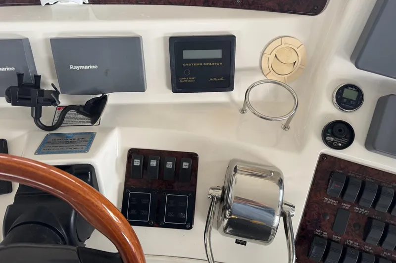  Yacht Photos Pics Control panel of a 2003 Sea Ray 480 Sedan Bridge with Raymarine electronics.