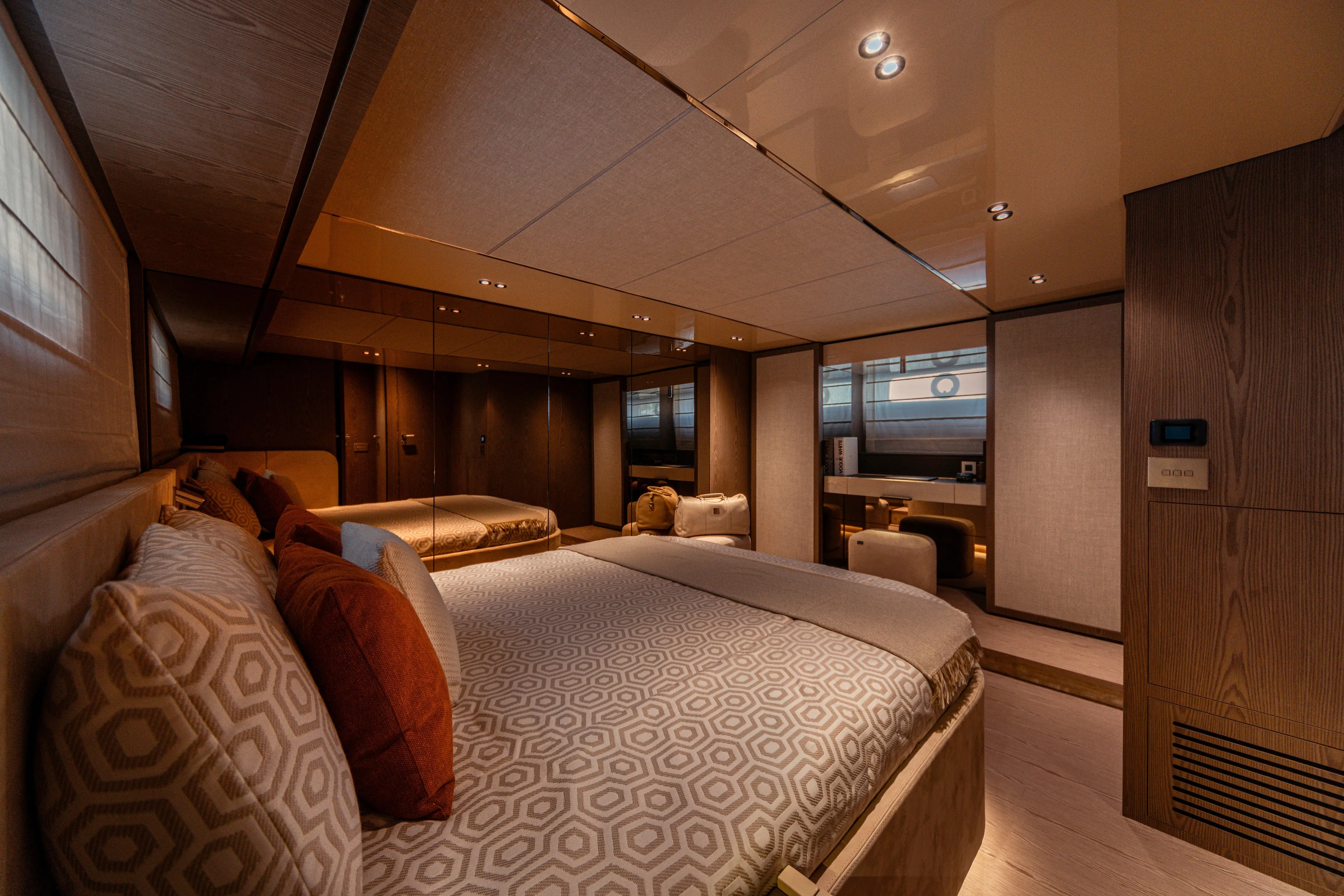  Yacht Photos Pics Luxurious bedroom interior of 2025 Invictus TT550 yacht with modern design and cozy ambiance.
