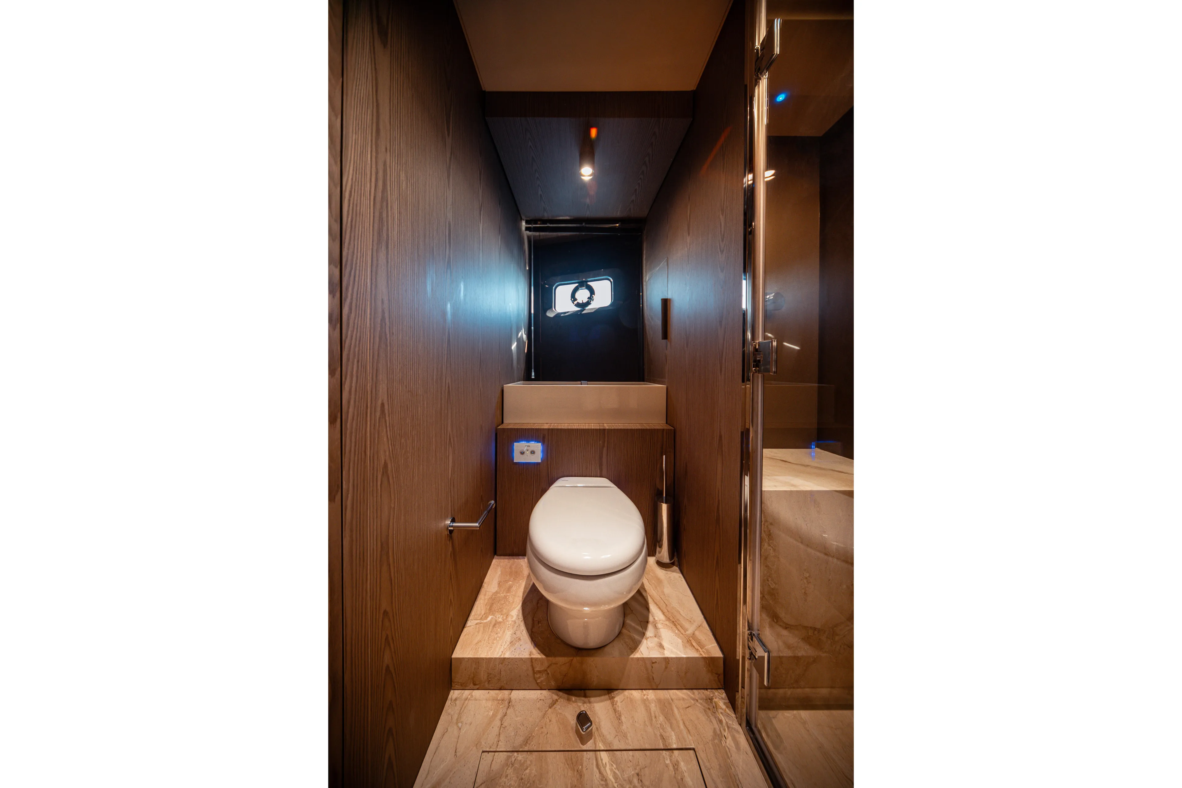  Yacht Photos Pics Luxurious bathroom interior of 2025 Invictus TT550 yacht with modern fixtures and wooden accents.