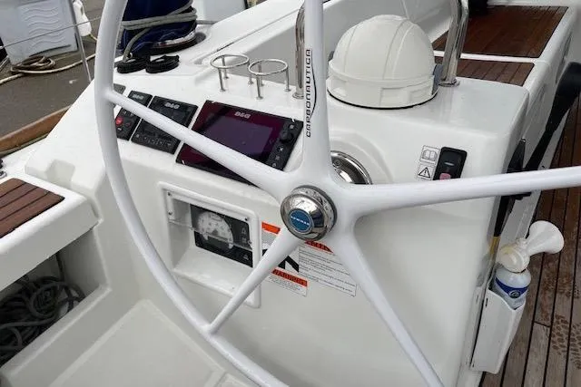 V-1 Yacht Photos Pics Steering wheel and controls of a 2018 Beneteau Oceanis 45 sailboat.