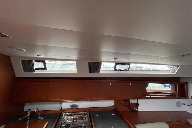V-1 Yacht Photos Pics Interior of 2018 Beneteau Oceanis 45 yacht, featuring a modern kitchen area.