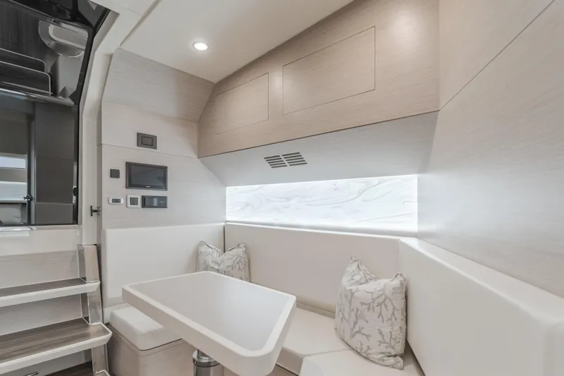 Mandalorian Yacht Photos Pics Luxurious interior of 2023 Scout 530 LXF yacht with modern seating and elegant design.