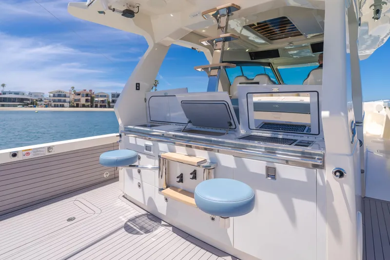 Mandalorian Yacht Photos Pics 2023 Scout 530 LXF luxury yacht interior with modern amenities and ocean view.