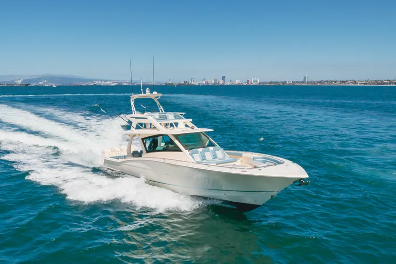 Mandalorian Yacht Photos Pics 2023 Scout 530 LXF luxury yacht cruising on open blue water.