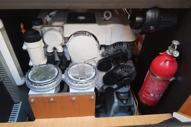  Yacht Photos Pics Engine compartment of a 2015 Jeanneau 57 yacht with visible fire extinguisher.