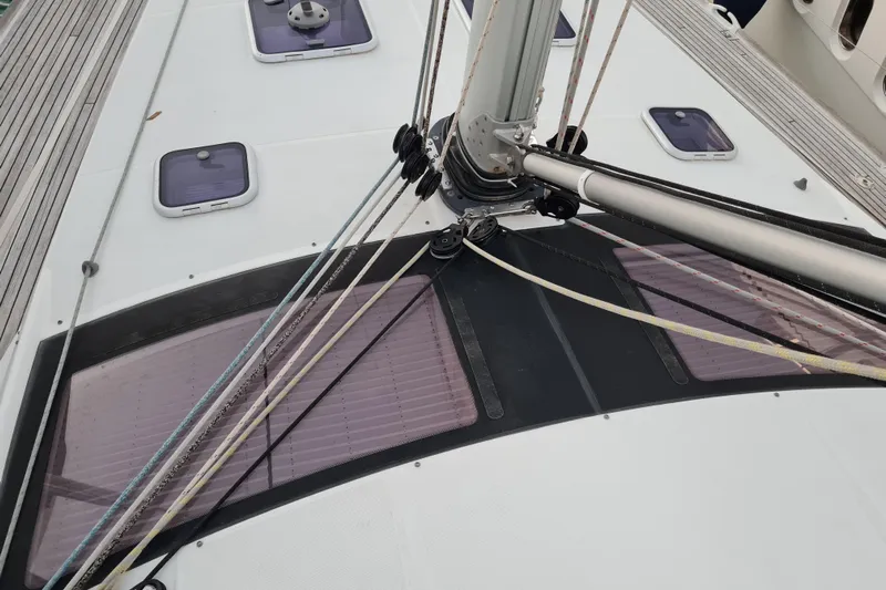  Yacht Photos Pics Deck view of 2015 Jeanneau 57 sailboat with rigging and hatches.