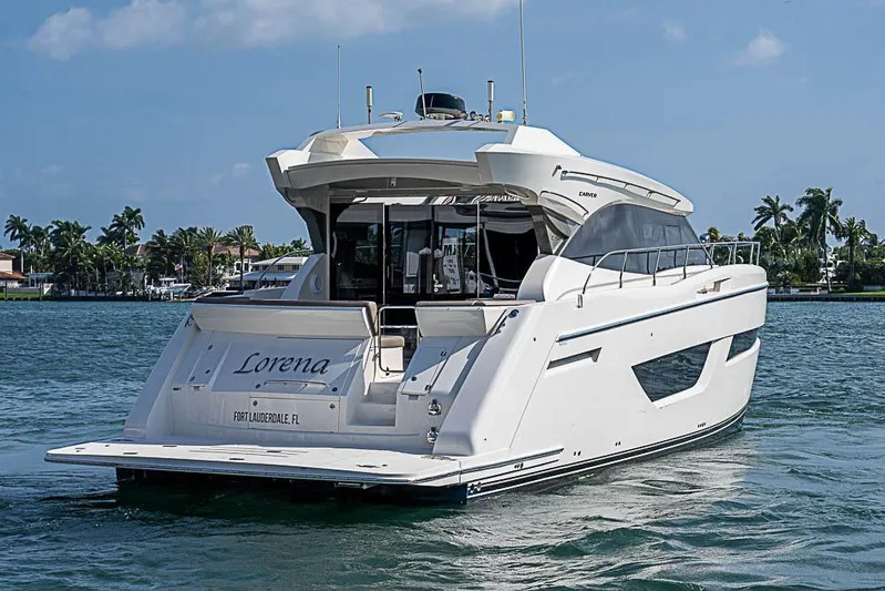  Yacht Photos Pics 2017 Carver C52 Coupe yacht on water, Fort Lauderdale, sunny day.