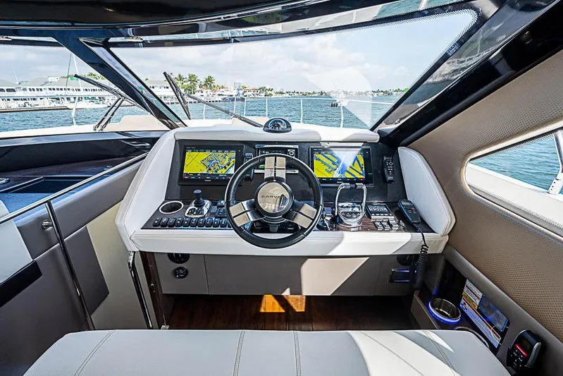  Yacht Photos Pics 2017 Carver C52 Coupe yacht cockpit with advanced navigation systems and luxurious interior design.
