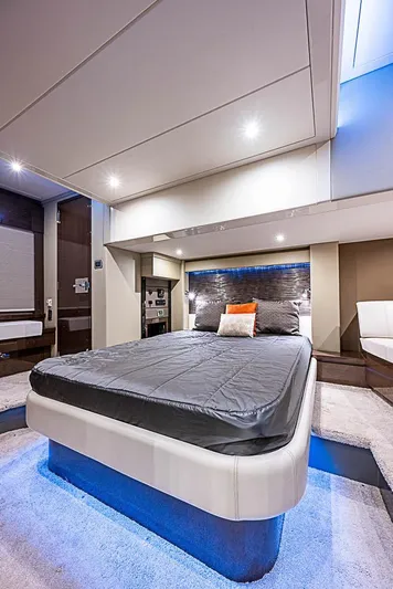  Yacht Photos Pics Luxurious interior of 2017 Carver C52 Coupe yacht with modern bedroom design.