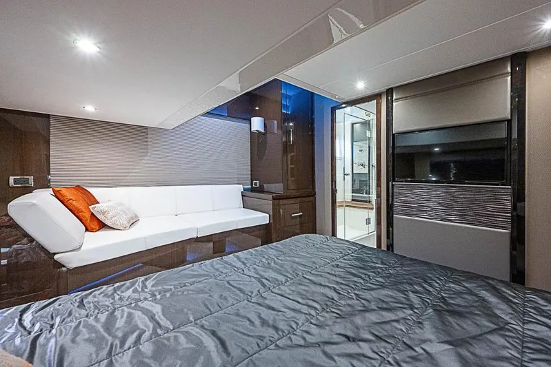  Yacht Photos Pics Luxurious interior of 2017 Carver C52 Coupe yacht with modern furnishings and ambient lighting.