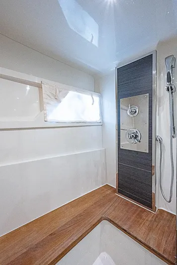  Yacht Photos Pics Luxurious bathroom in 2017 Carver C52 Coupe yacht with modern shower design.