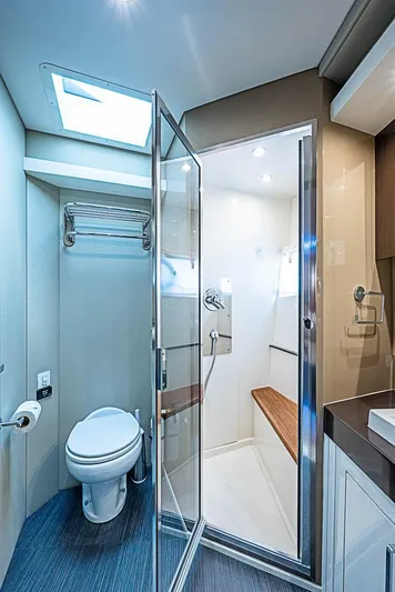  Yacht Photos Pics Luxurious bathroom in 2017 Carver C52 Coupe yacht with shower and skylight.