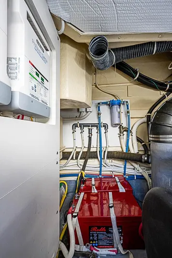  Yacht Photos Pics Engine room of 2017 Carver C52 Coupe with batteries and wiring.