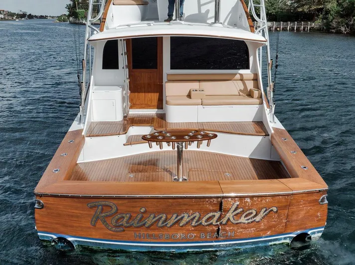 Rainmaker Yacht Photos Pics 2021 Garlington Convertible yacht "Rainmaker" with teak deck, docked at Hillsboro Beach.