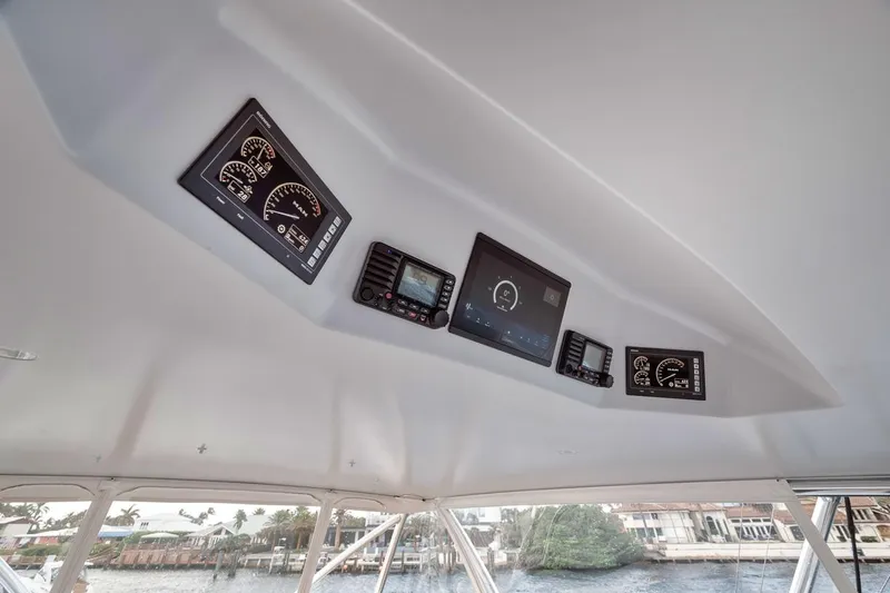 Rainmaker Yacht Photos Pics 2021 Garlington Convertible boat dashboard with modern gauges and controls.