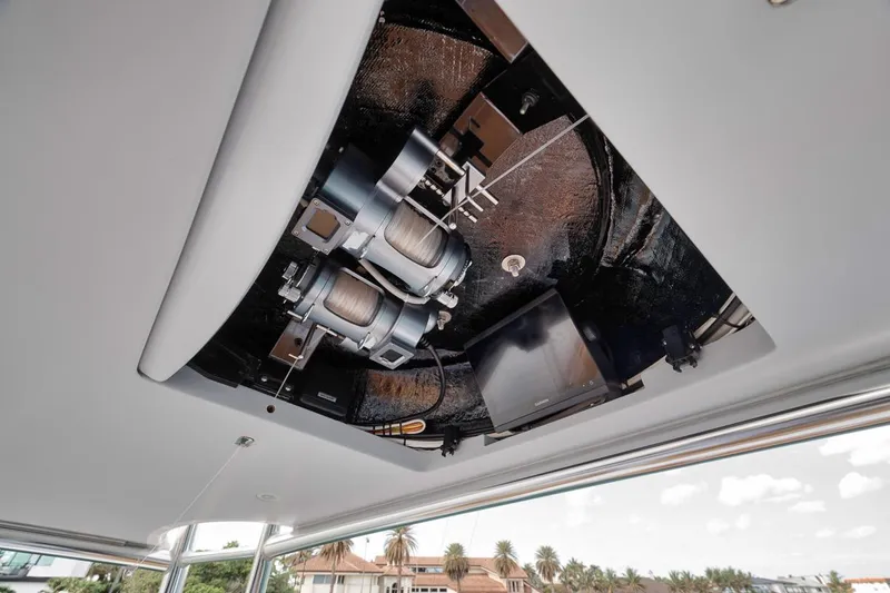 Rainmaker Yacht Photos Pics 2021 Garlington Convertible yacht engine compartment, showcasing mechanical components and sleek design.