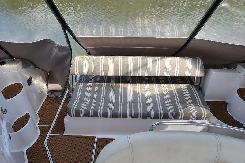  Yacht Photos Pics 2009 Regal Commodore 3760 IB interior with striped seating and wooden flooring.