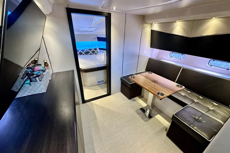  Yacht Photos Pics Luxurious interior of 2013 Azimut Verve 40 yacht with modern seating and table.