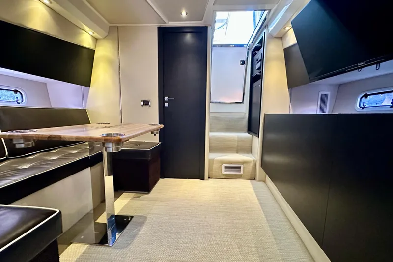  Yacht Photos Pics Interior of 2013 Azimut Verve 40 yacht with modern seating and table.