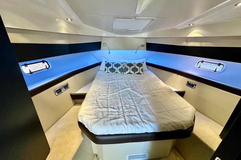  Yacht Photos Pics Luxurious cabin interior of 2013 Azimut Verve 40 yacht with cozy bed and modern design.