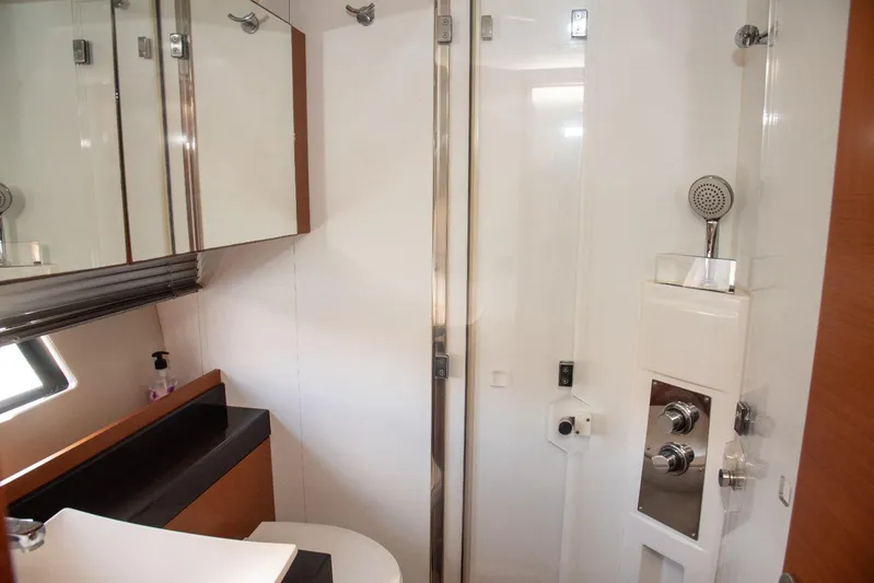  Yacht Photos Pics Luxurious bathroom in 2013 Prestige 500 S yacht with modern fixtures and sleek design.