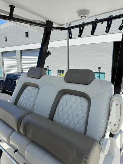  Yacht Photos Pics 2023 World Cat 325 CC boat seats with diamond stitching and rod holders.