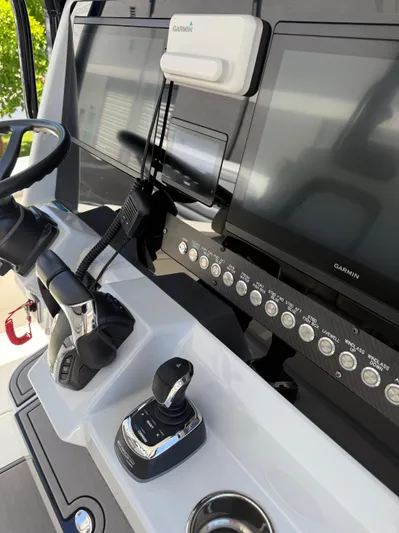  Yacht Photos Pics 2023 World Cat 325 CC helm with Garmin displays and controls.