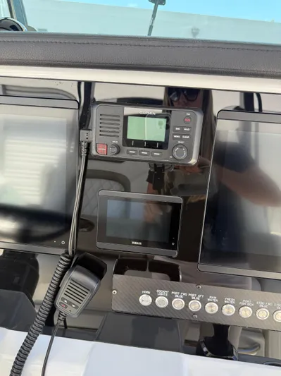  Yacht Photos Pics Control panel of 2023 World Cat 325 CC boat with Garmin and Yamaha displays.