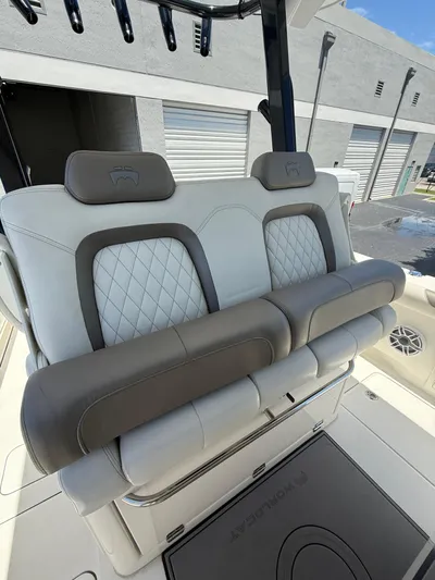  Yacht Photos Pics 2023 World Cat 325 CC boat seating with quilted upholstery and armrests.