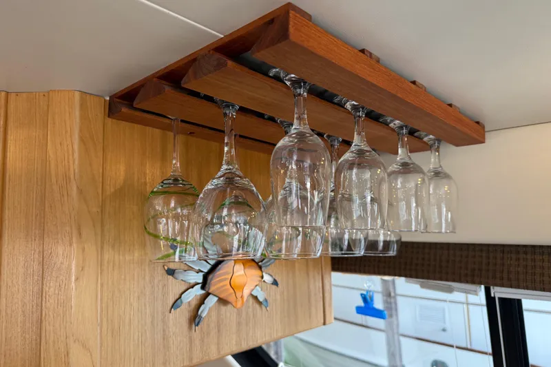  Yacht Photos Pics Hanging wine glasses in 1999 Bayliner 3988 Command Bridge Motoryacht interior.