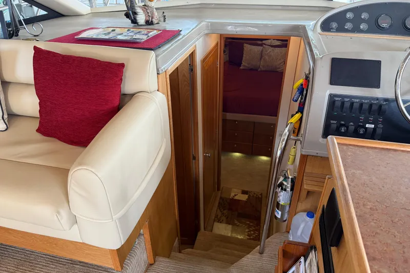  Yacht Photos Pics Interior of 1999 Bayliner 3988 Command Bridge Motoryacht with helm and cabin entrance.