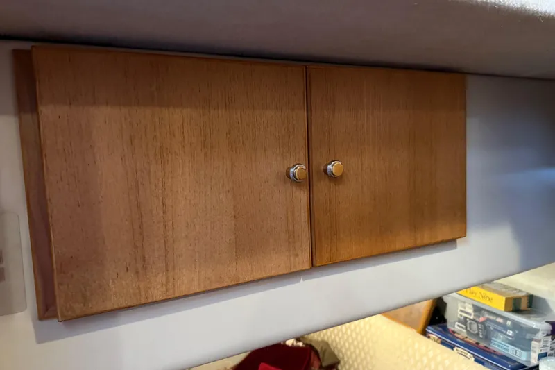  Yacht Photos Pics Wooden cabinet doors inside a 1999 Bayliner 3988 Command Bridge Motoryacht.