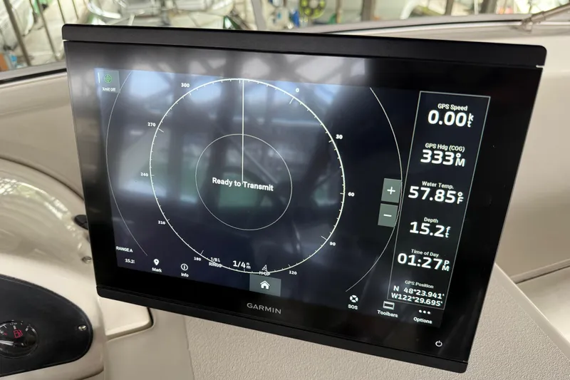  Yacht Photos Pics Garmin navigation display on 1999 Bayliner 3988 Command Bridge Motoryacht, showing GPS and radar data.
