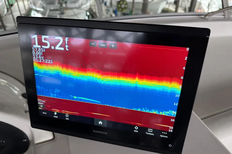  Yacht Photos Pics Garmin sonar display on 1999 Bayliner 3988 Command Bridge Motoryacht showing depth and temperature.