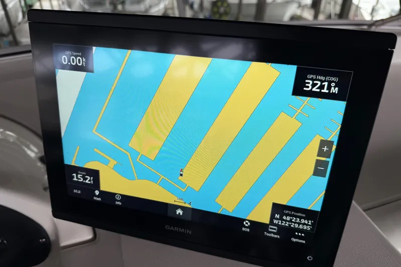  Yacht Photos Pics Garmin navigation display on 1999 Bayliner 3988 Command Bridge Motoryacht showing map and coordinates.