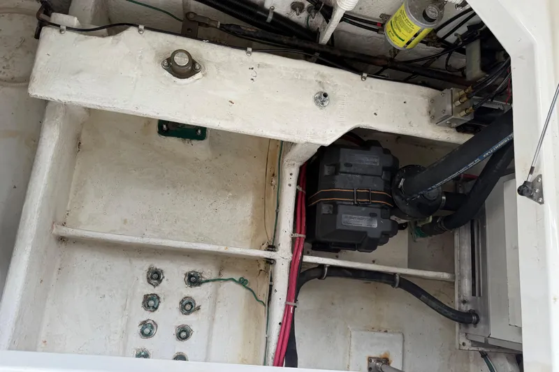  Yacht Photos Pics Engine compartment of 1999 Bayliner 3988 Command Bridge Motoryacht, showing battery and wiring.