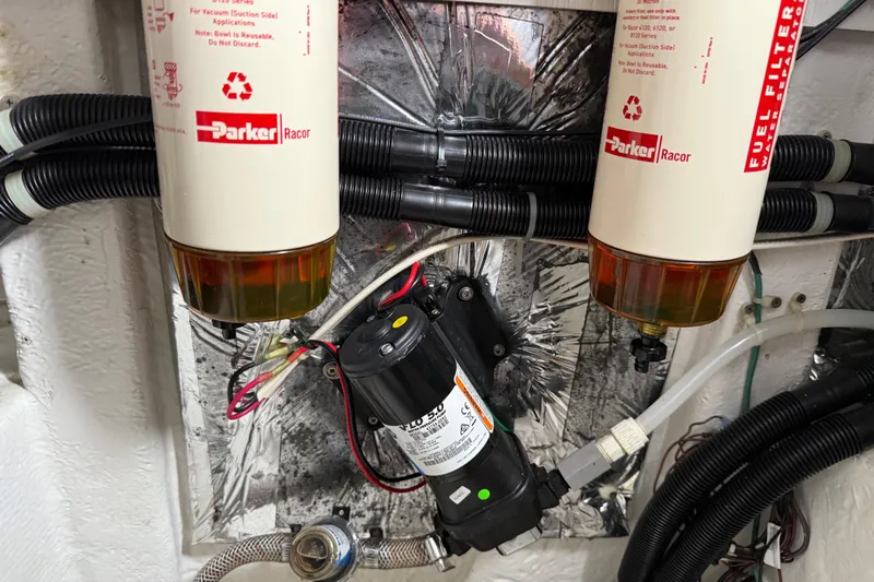  Yacht Photos Pics Engine room of 1999 Bayliner 3988 with Parker Racor fuel filters and wiring.