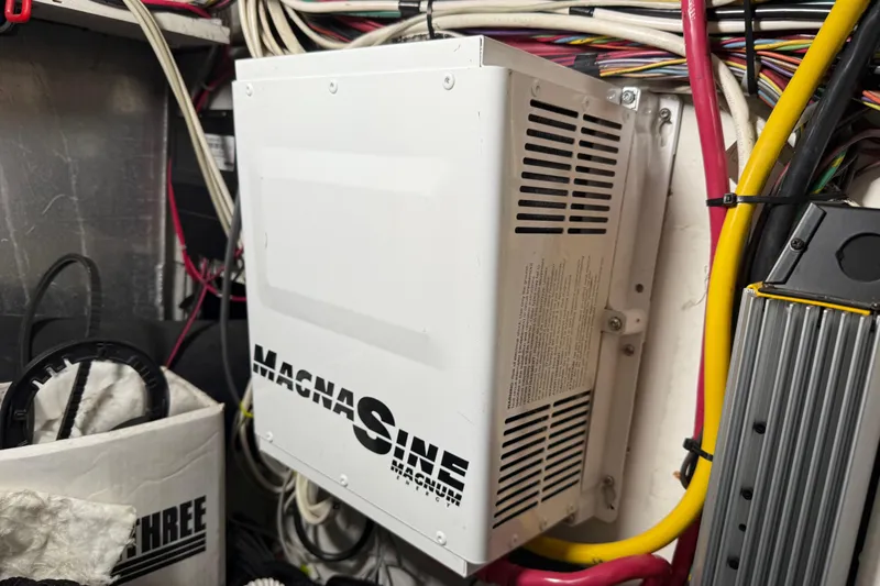  Yacht Photos Pics Electrical system inside 1999 Bayliner 3988 Command Bridge Motoryacht, featuring a Magnum inverter.