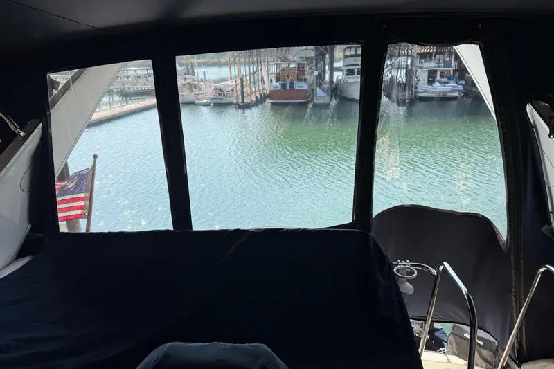  Yacht Photos Pics View from inside a 1999 Bayliner 3988 Command Bridge Motoryacht overlooking a marina.