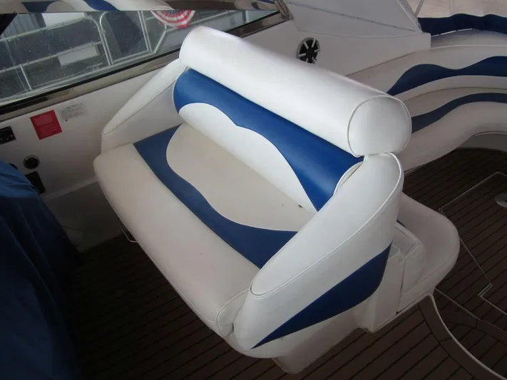  Yacht Photos Pics 2000 Cruisers Yachts 4270 Express interior with blue and white seating.