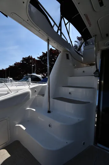  Yacht Photos Pics Staircase on 2003 Regal Commodore 3880 yacht, leading to upper deck.