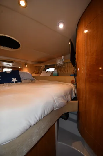  Yacht Photos Pics Luxurious cabin interior of 2003 Regal Commodore 3880 yacht with cozy bedding.