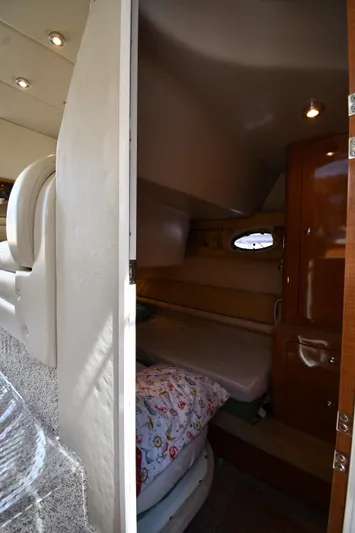  Yacht Photos Pics Interior cabin of 2003 Regal Commodore 3880 yacht with cozy sleeping area.